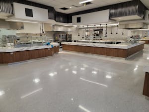 Nicely polished floor of a school kitchen